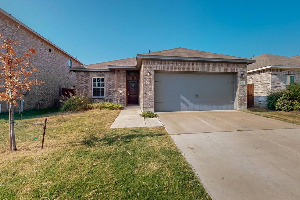 View of front of property featuring a front yard a
