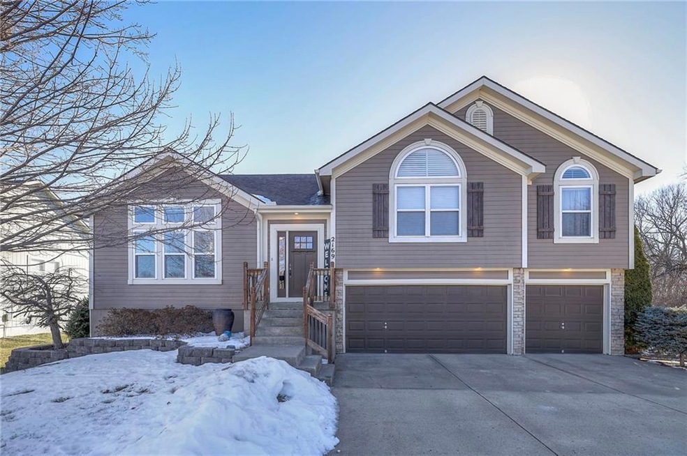 2169 E Sierra Dr, Raymore, MO 64083 - photo 1