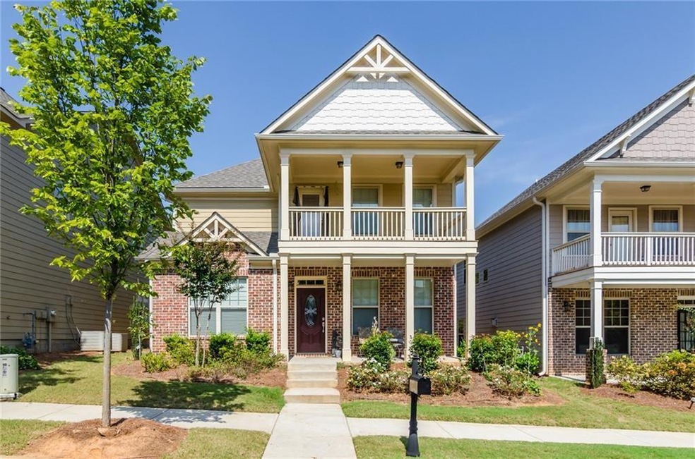 View of front of property with a front yard and a 