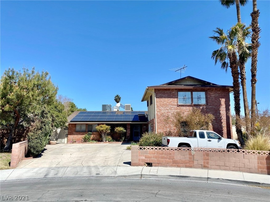 Exterior of home with lots of parking