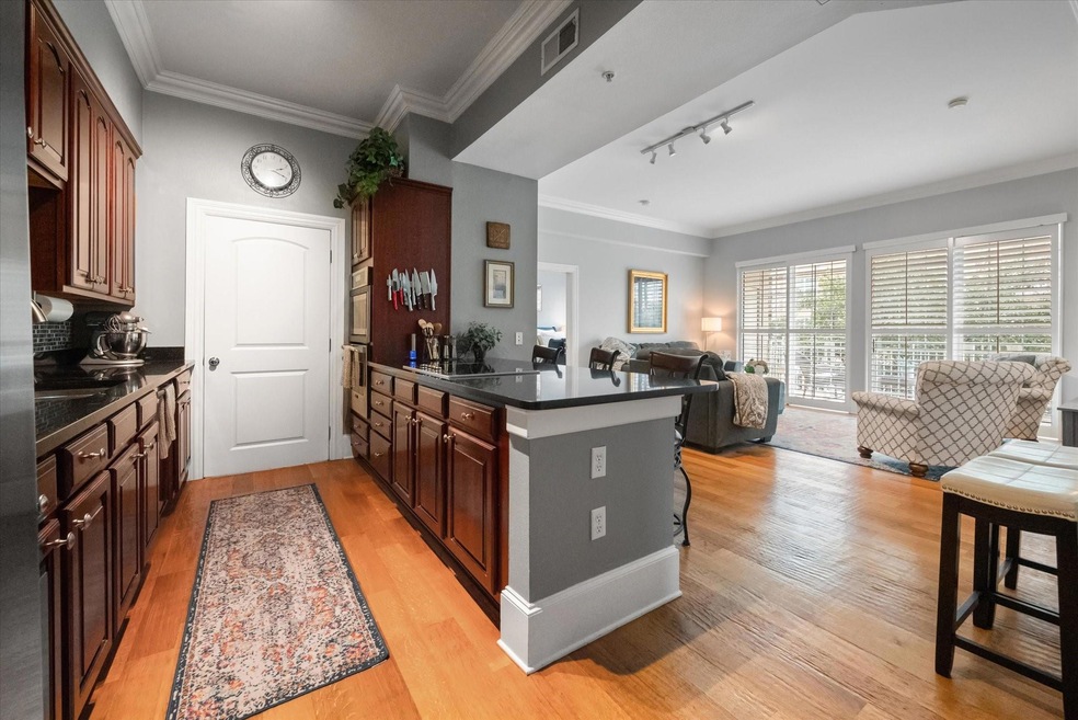 Kitchen featuring ornamental molding, a kitchen br