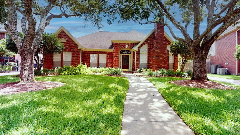 Rare One Story with two beautiful live oak trees.