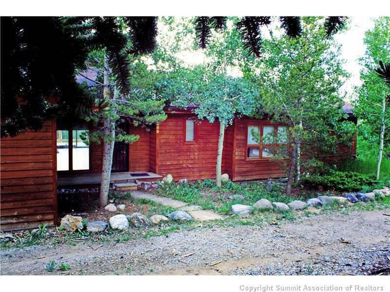 Exterior Front. Privately Situated Among the Trees