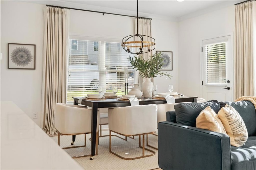 Dining area featuring a chandelier