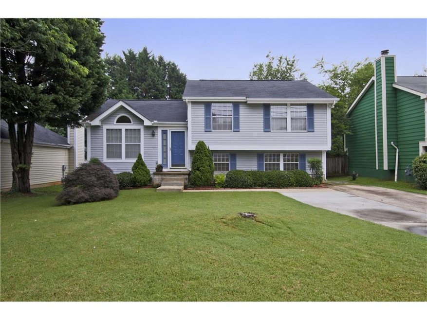 Welcome home to this professionally landscaped hom