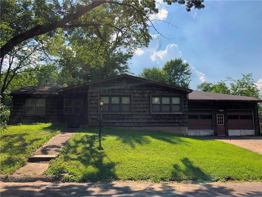 Home sits on a nice lot with mature trees.