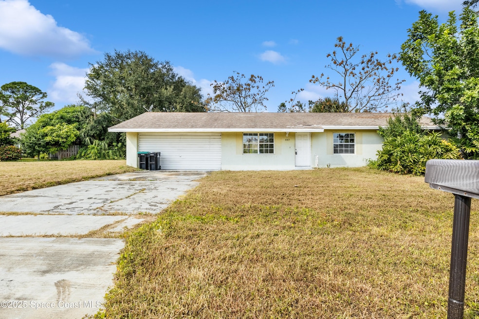 697 Castaways St NE, Palm Bay, FL 32907 - photo 1