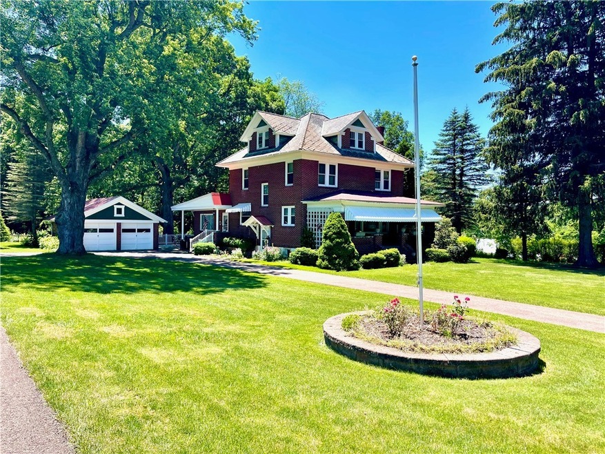 Welcome Home!  This beautiful 2 story brick extend