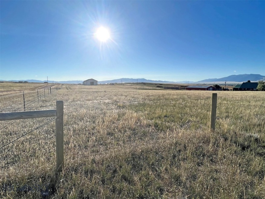 NW fenced corner. Downing and Snowcrest