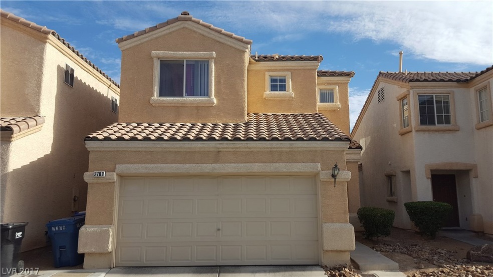 Front Exterior w/ 2 car garage