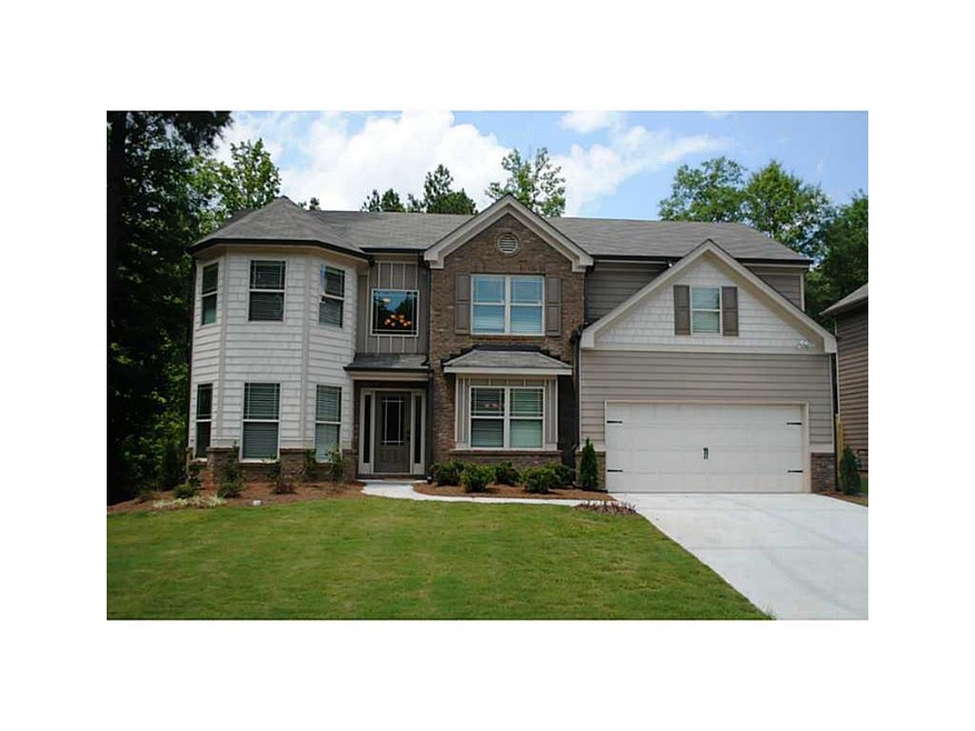 Exterior Front. Georgian with 2-story family room