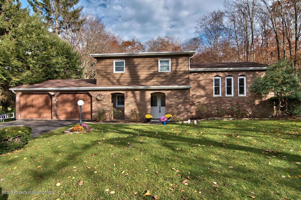 207 Wilson Dr, Roaring Brook Township, PA 18444 - photo 1