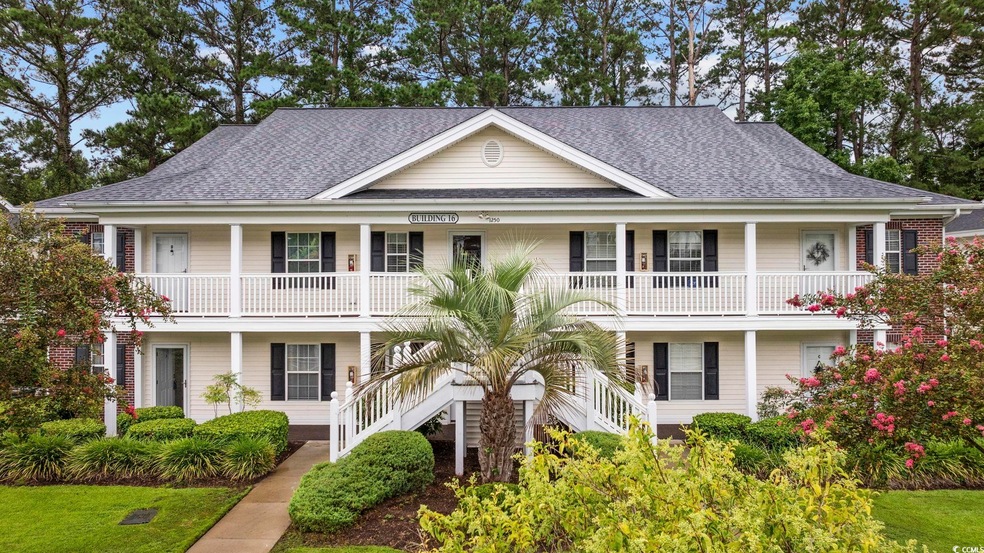 View of front of property featuring a balcony