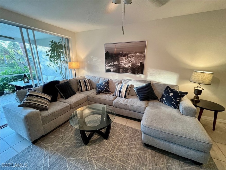 Living area with tile patterned flooring