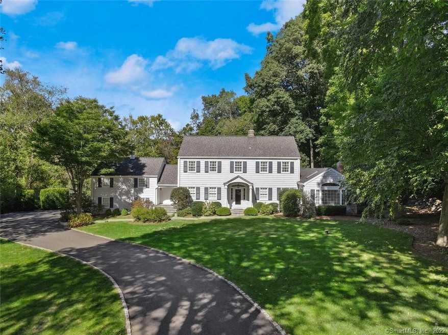 Gracious front exterior with sweeping drive