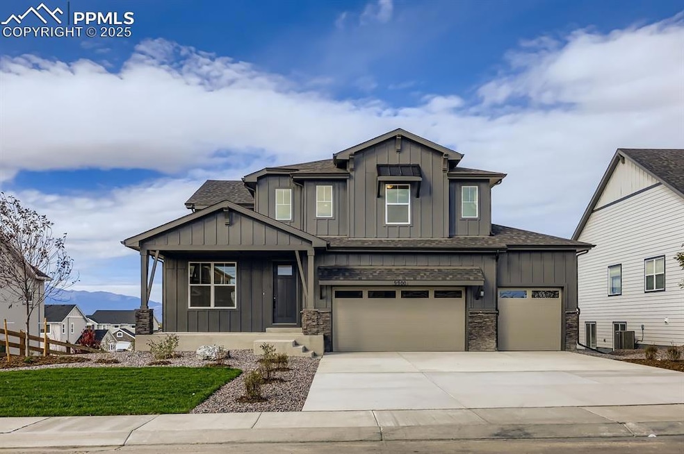 Craftsman house with board and batten siding, a shingled roof, driveway, and an attached garage