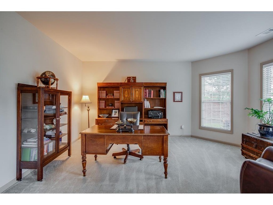 Bright office space. This space can be uses as a formal living room or kids play room.