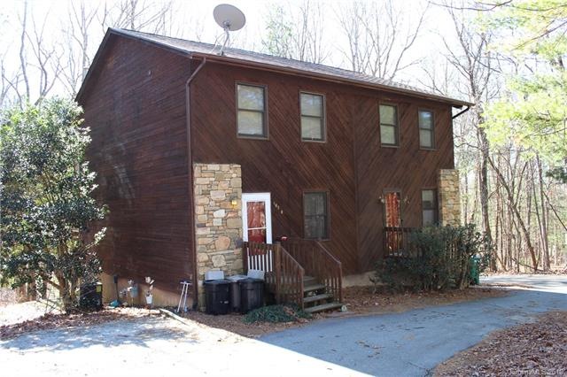 Well-maintained wood and stone exterior