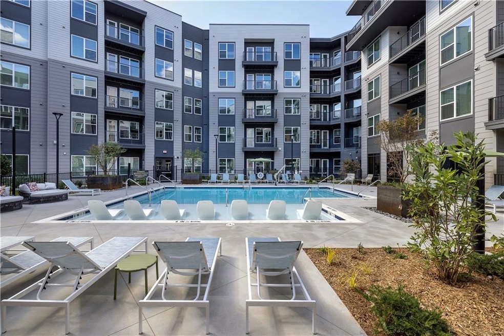 Community pool featuring a patio area