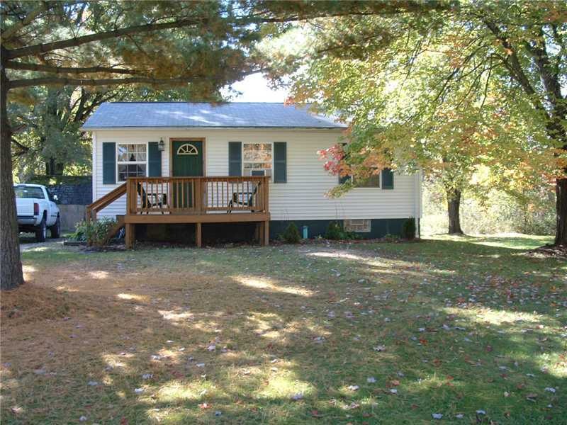Exterior Front. Well maintained vinyl, roof and wi