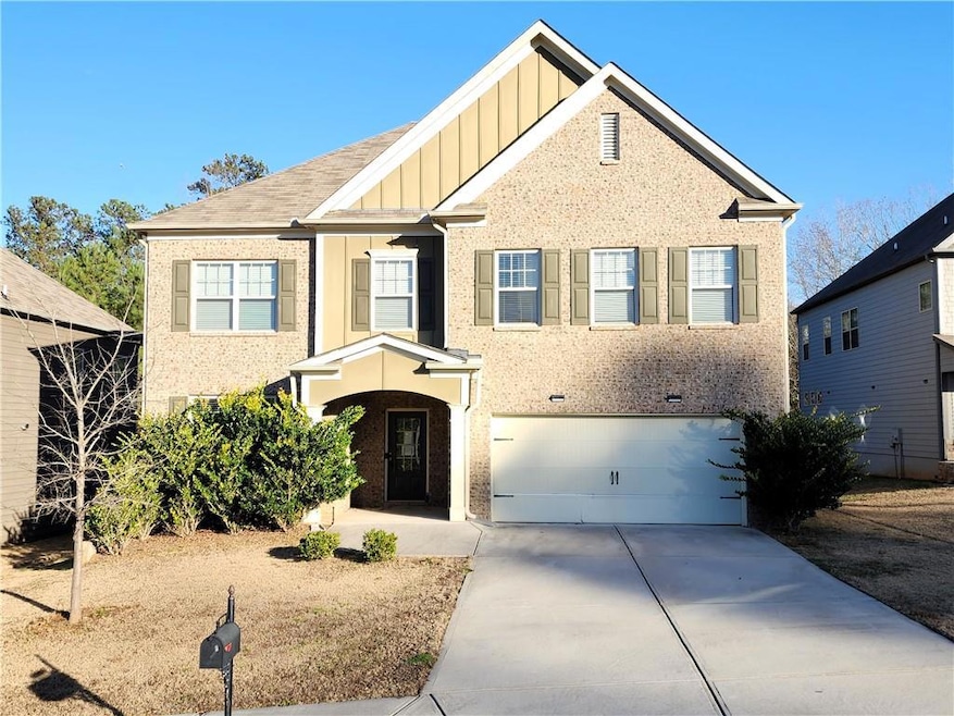 View of front of property with a garage