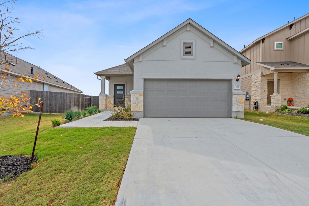 202 Lime St, Mustang Ridge, TX 78610 - photo 1