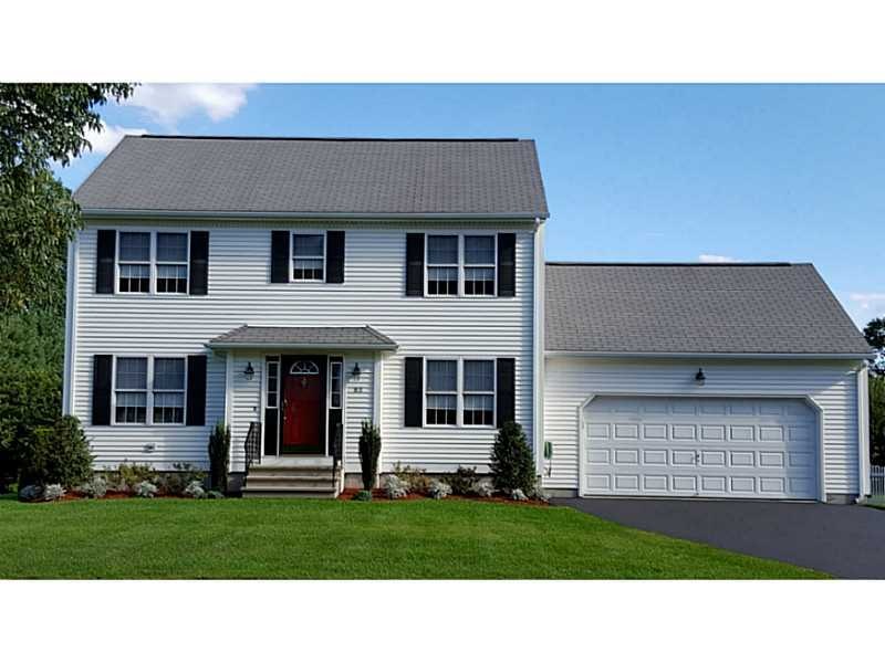 Exterior Front. Well maintained yard