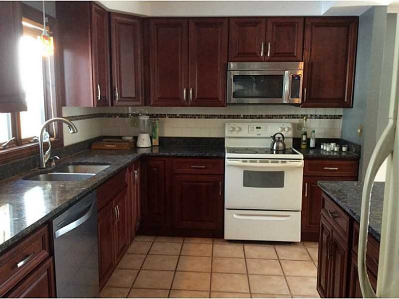 Kitchen. Tons of granite counter space.