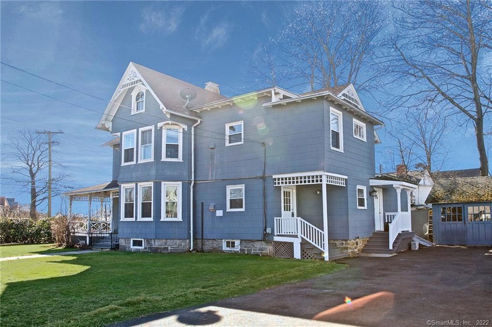 Grand Street side entrance with 2 car garage.  Als