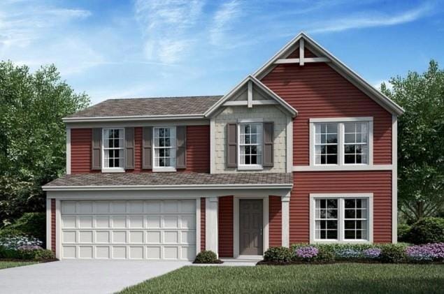 View of front of home with a garage