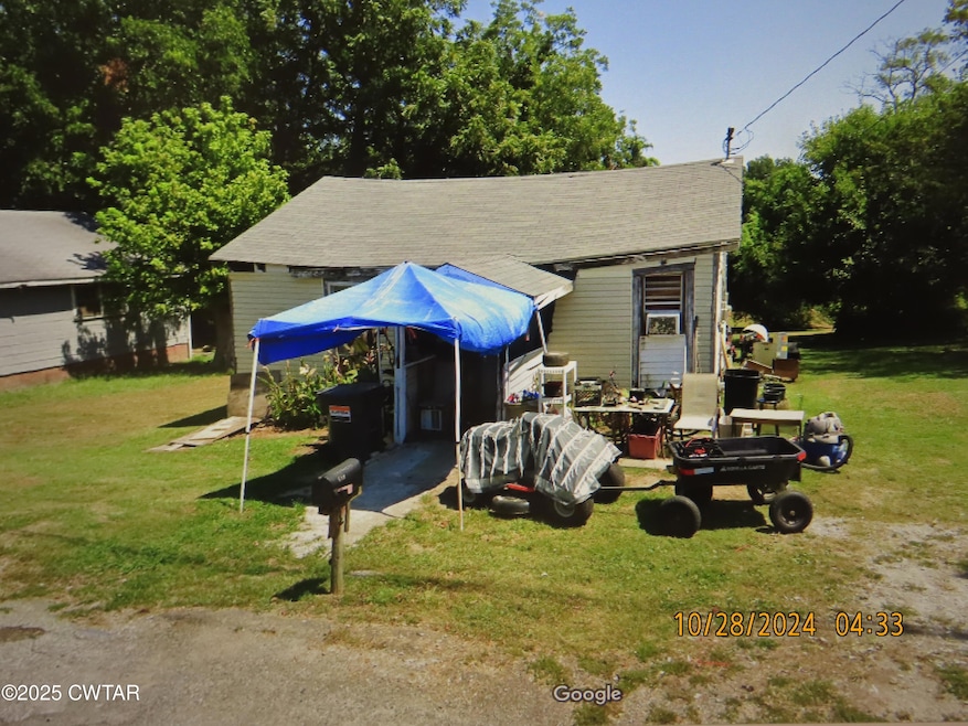 610 N Grayson St, Newbern, TN 38059 - photo 1