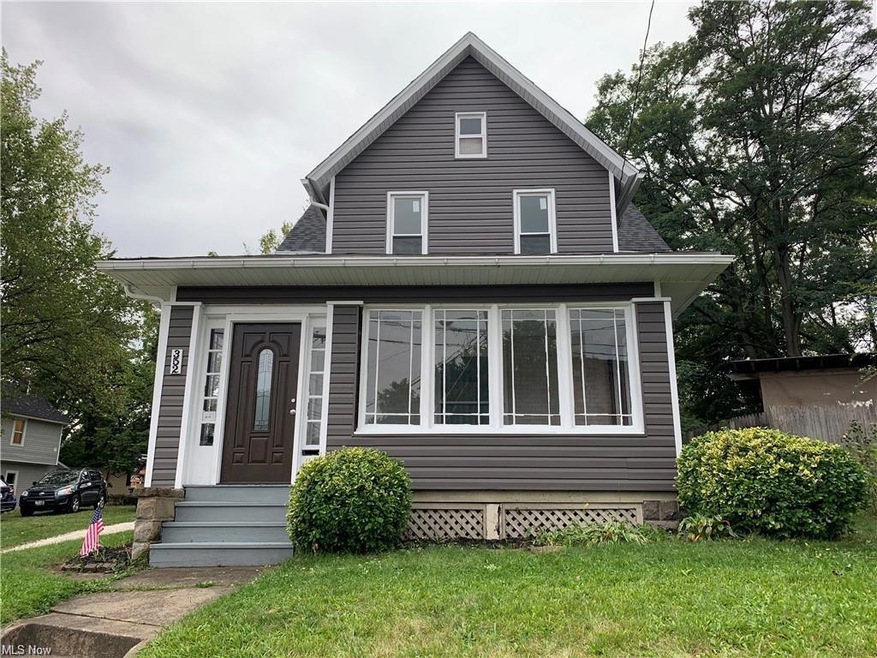View of front of house with a front yard