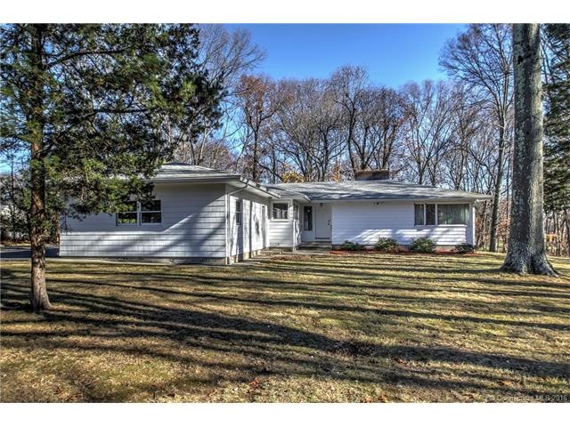 Well maintained 4 bedroom, 2 bath L shaped ranch s