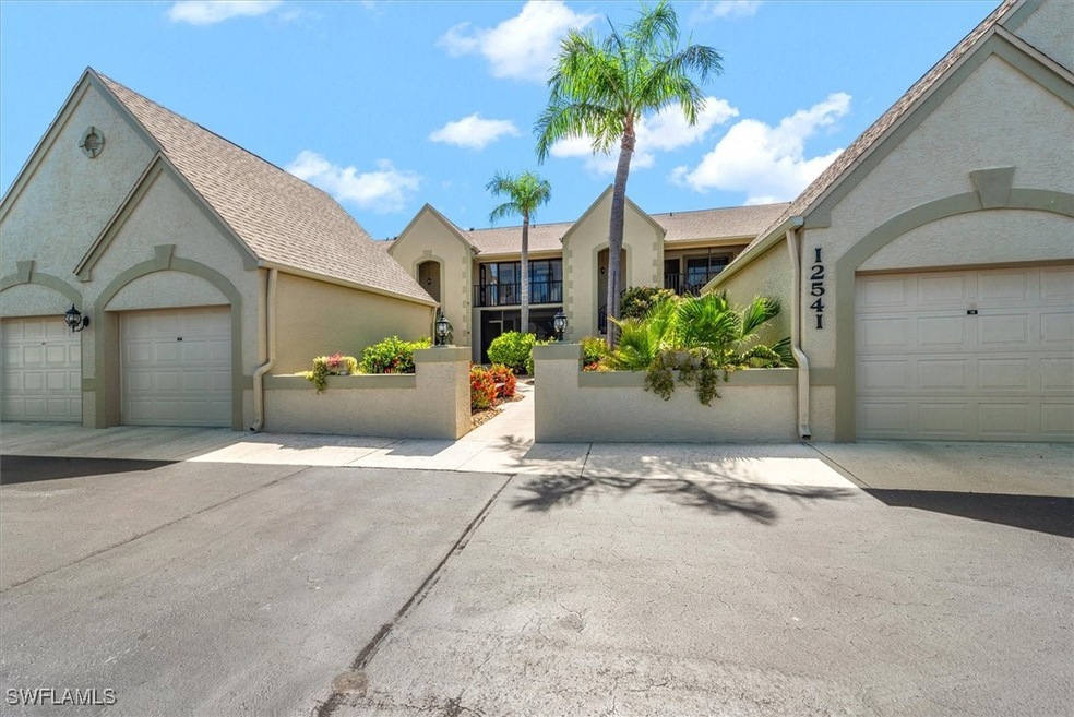 View of front of property featuring stucco siding