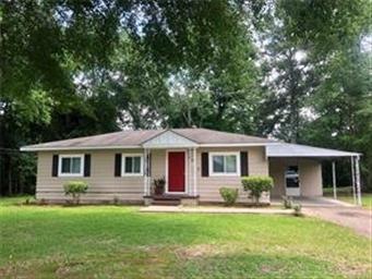 Welcome to 4830 Ward Rd with a large yard and nice