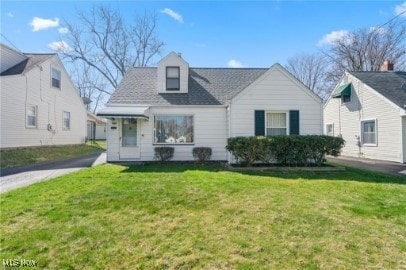 View of front of home with a front yard