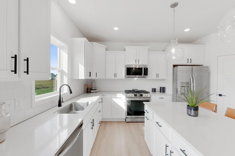 (Photo of a similar home, actual finishes may vary)