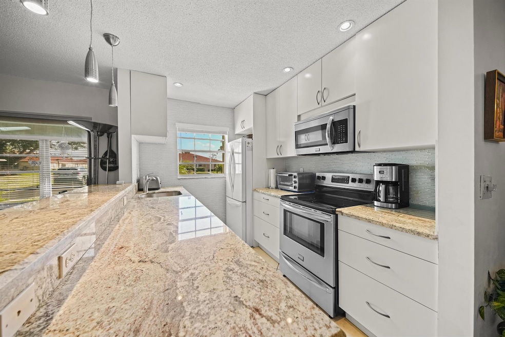 4875 NW 3rd Ct unit C, Delray Beach, FL 33445 - photo 1