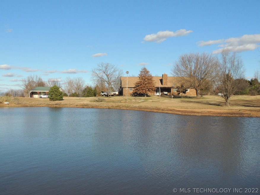 Best view of this home from over the stocked pond!
