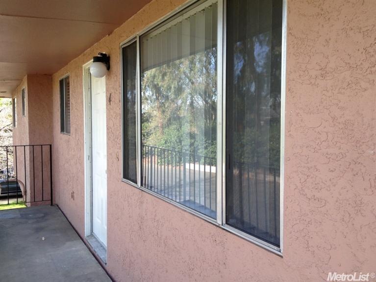 A desirable upstairs condo with a nice balcony in 
