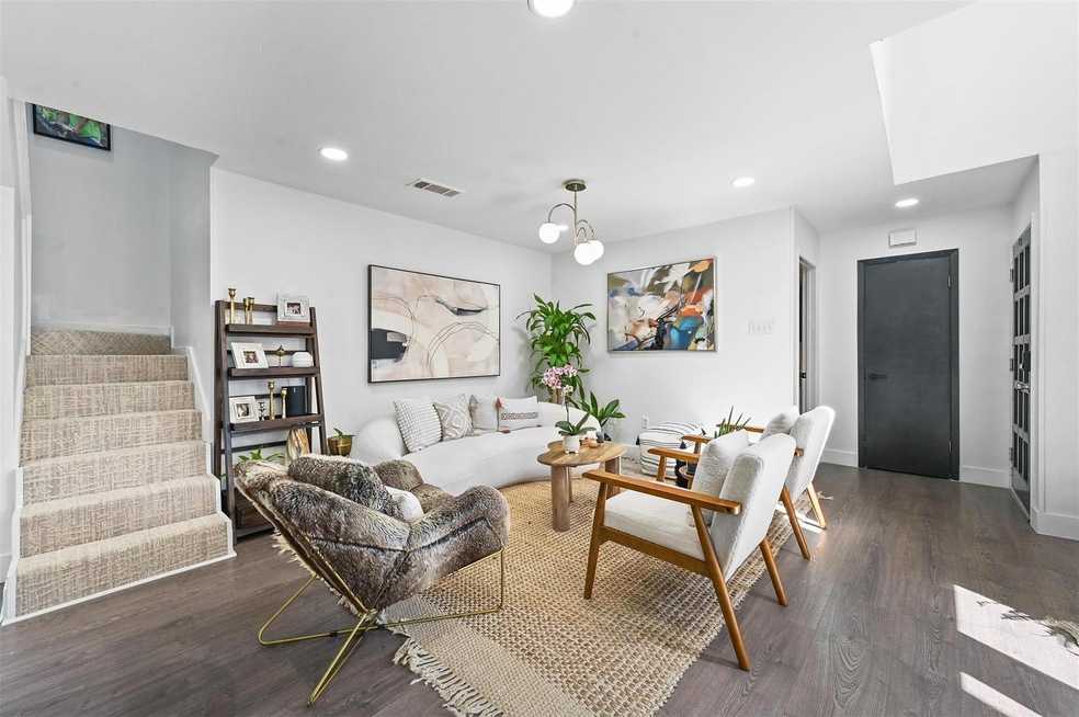 Living room featuring dark hardwood / wood-style f