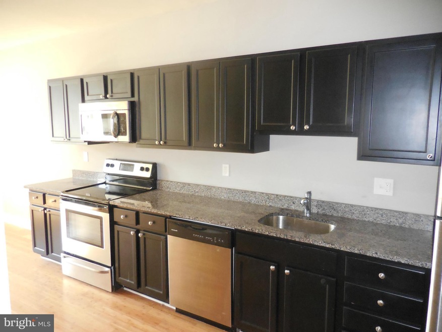 1226 N Calvert St unit 4, Baltimore, MD 21202 - photo 1