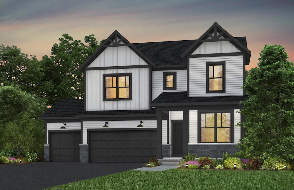 High-quality modern materials, including LP siding for the front, vinyl siding, stone accents, and contrasting trims combine to create a sophisticated and durable exterior.