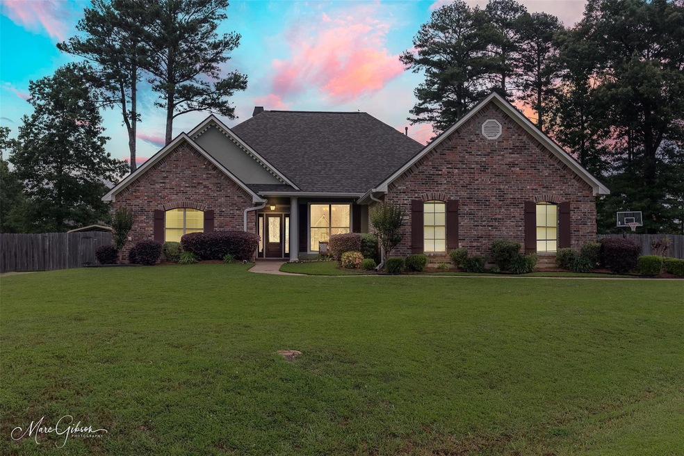 View of front of house with a yard