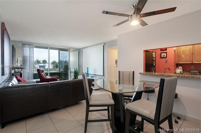 ENTRANCE VIEW. OPEN LIVING AND DINING ROOM