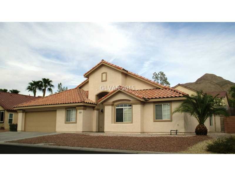 Facade/Exterior Front. with desert landscaping and