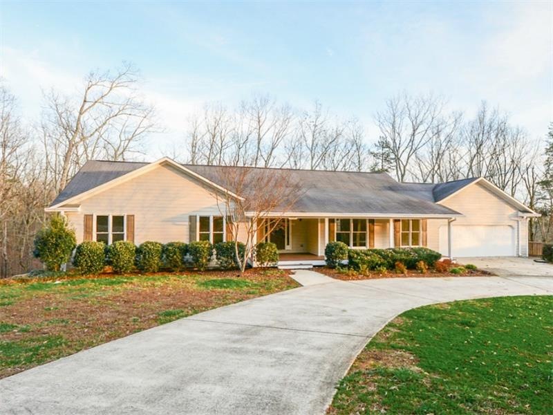 Circular drive leads to RANCH on 2.56 acres