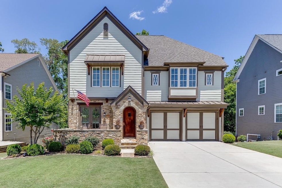 View of front of home featuring a garage and a fro