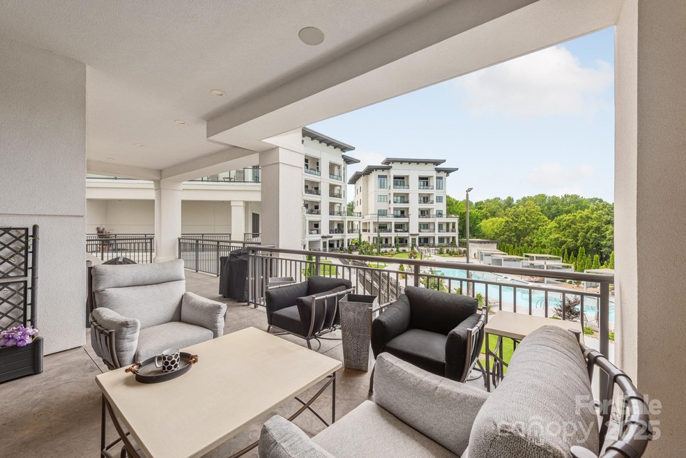 Covered wrap around lanai one level above the pool