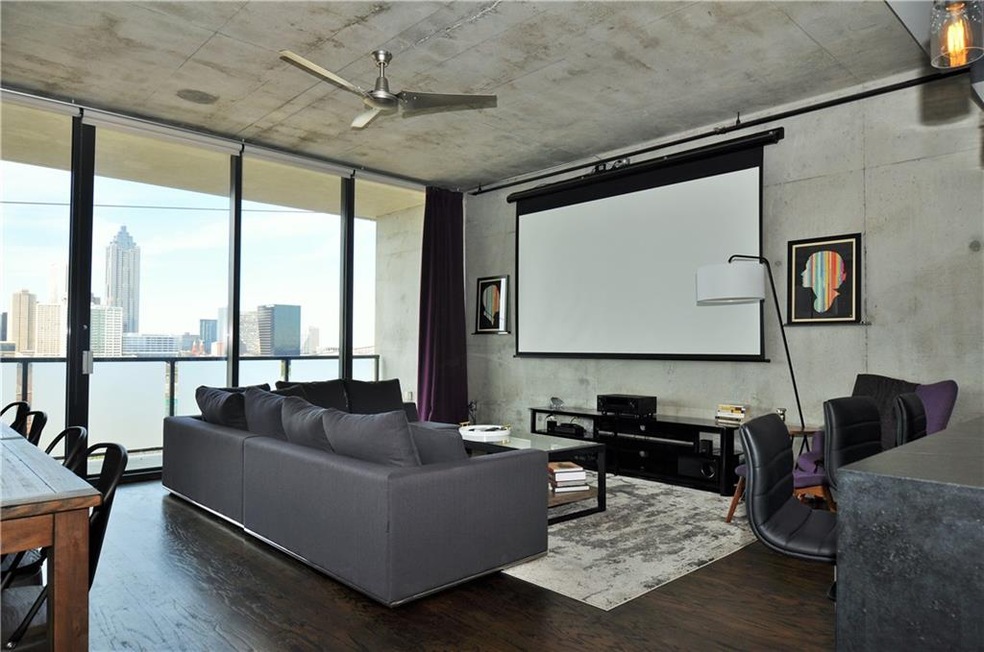 Spacious living room/dining room with big scrren p